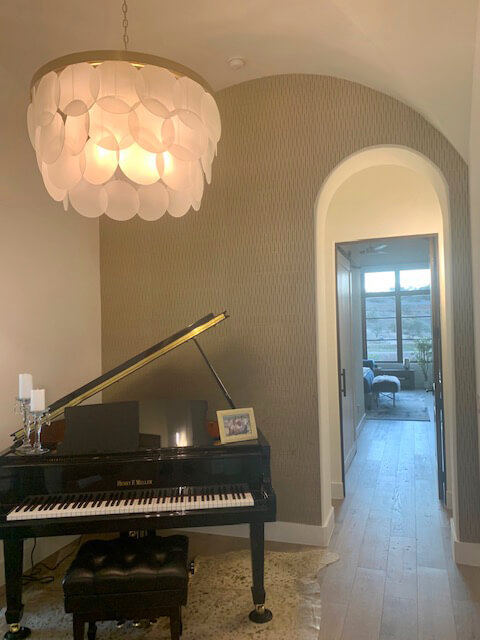 Interior designed home with piano.